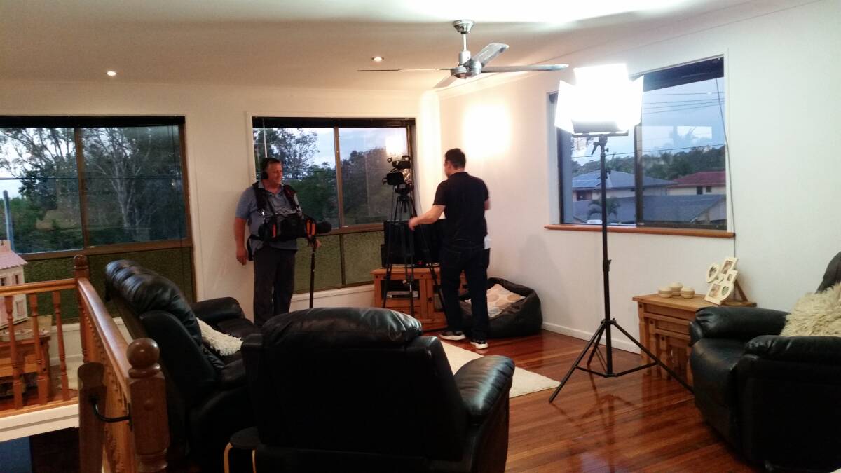 DURING FILMING: Crew from the BBC's 'Wanted Down Under' television series filming in the Wynn's Capalaba house recently.