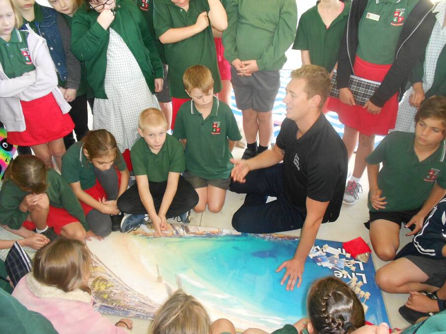 Trent "Maxi" Maxwell presents his Live Learn Survive workshop at Russell Island State School.