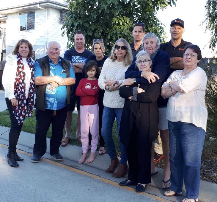 APPEAL: Cr Tracey Huges, with residents of St Anthony's Drive, Alexandra Hills, who are appealing for street lights to be installed.