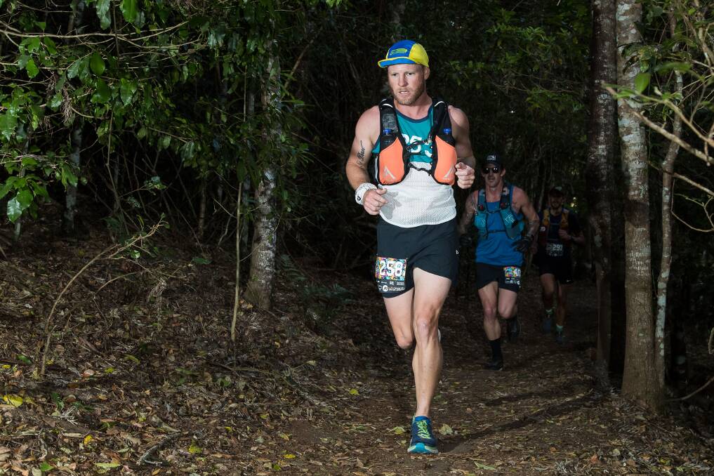 ON TRACK: Victoria Point resident Keiron Douglass on a trail run.