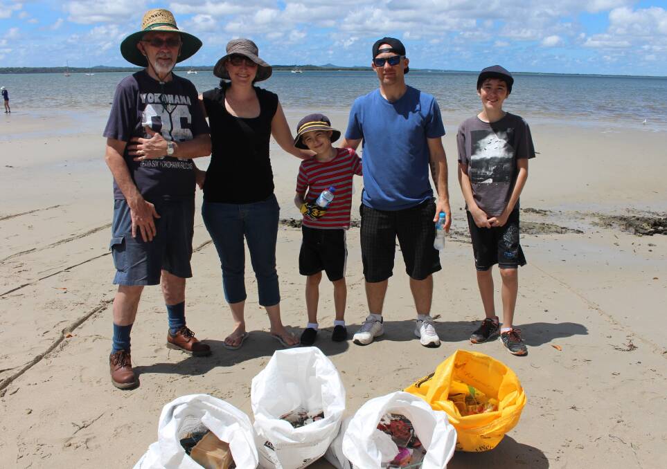 Supportive walkers who joined the Redlands Kayak Tours group by clearing rubbish alongside a Victoria Point creek on Sunday.