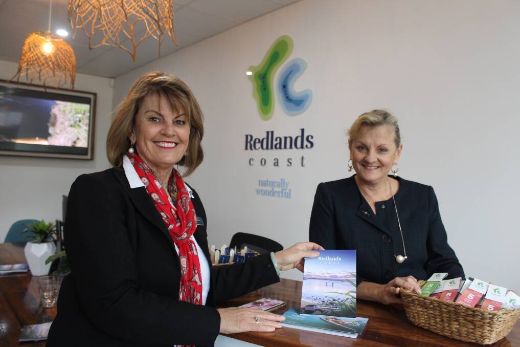 SPRUIKING REDLANDS COAST: Cr Wendy Boglary and mayor Karen Williams at the Redlands Coast visitor information centre at Raby Bay Harbour. Photo: Cheryl Goodenough