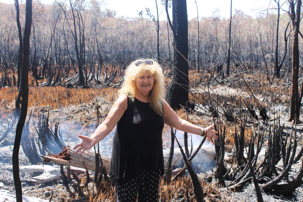 ON RUSSELL: Russell Island wildlife carer Sharon Keegan, who passed away last month, pictured after bushfires on the island in 2017.