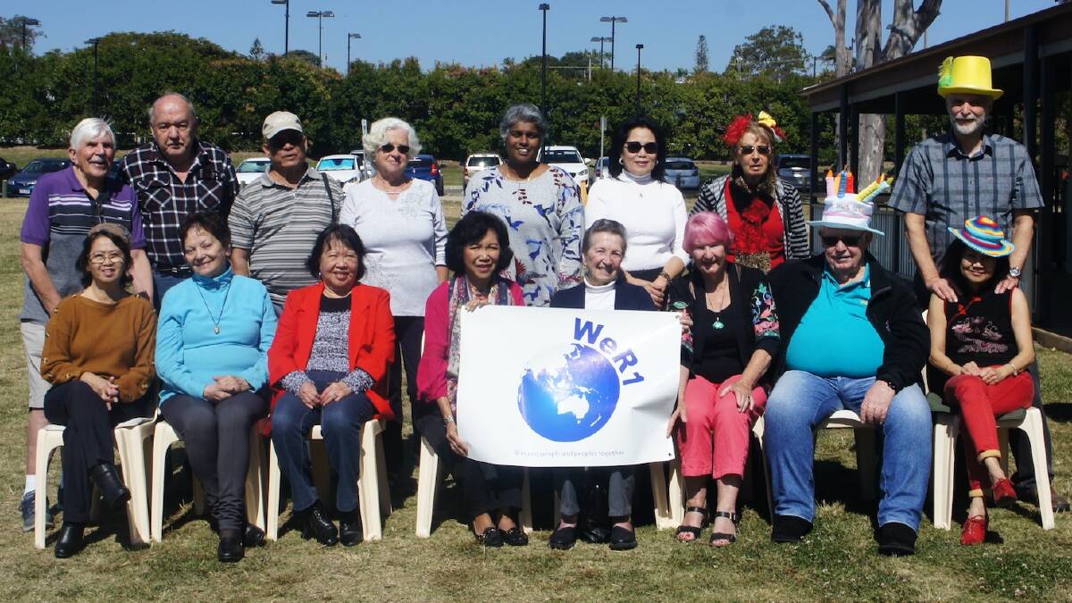 ANNIVERSARY: The WeR1 multicultural group celebrates its 14th anniversary with a funny hat theme.