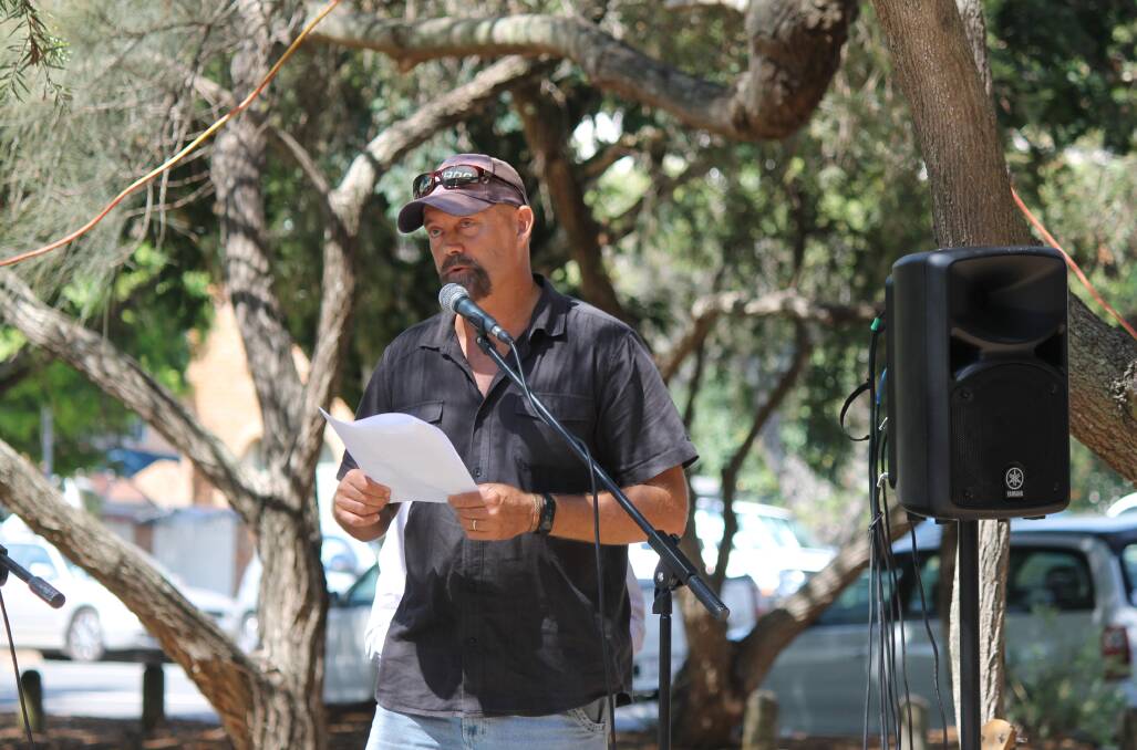 RESIDENT: Steven Komorowski from the Redland Bay Residents Action Group speaks at a rally at Weinam Creek in March. Photo: Cheryl Goodenough