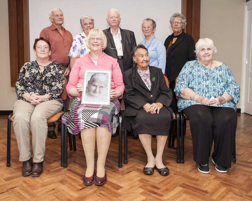 INSPIRING: Winners of the 2016 Blue Care Redland Inspiring Seniors Awards were recognised for their contribution to the city. The award winners are Alf Allison, Kathy Huf, Peter Lindley, Jill Lindley, Lynette Shipway and (front) Sue Adams, Carol Brough holding a photograph of Isabella Alcock, Aunty Margaret Iselin and Joan Brennan.