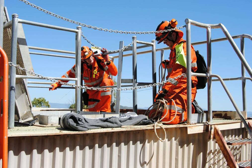 IN ACTION: During a scenario at the SES State Disaster Rescue Challenge at Townsville. Photo: Queensland Fire and Emergency Services