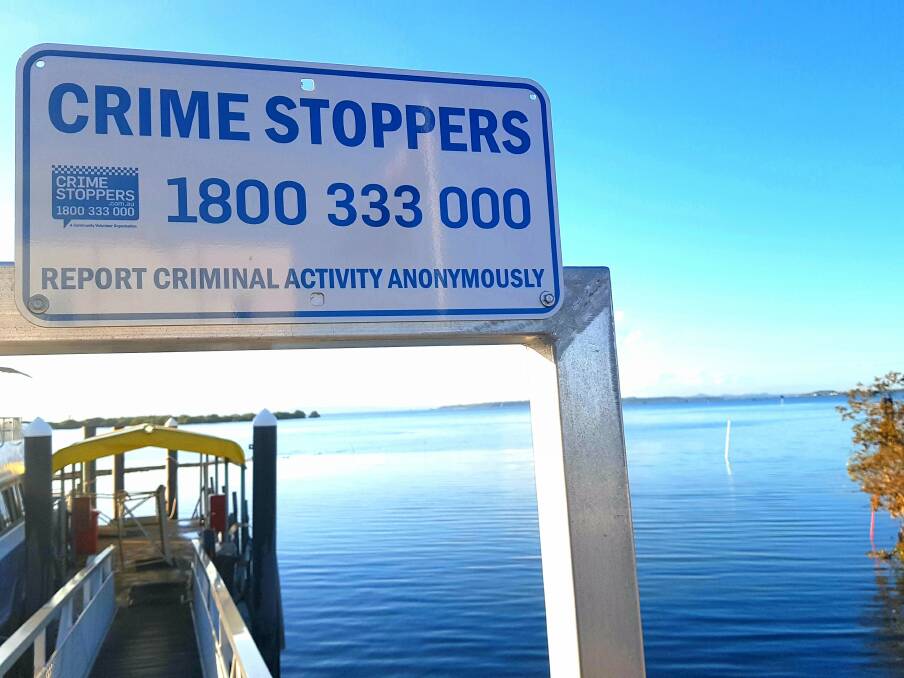 SIGNAGE: The bayside's volunteer Crime Stoppers group has installed signs at Toondah Harbour to create awareness of the anonymous reporting service.