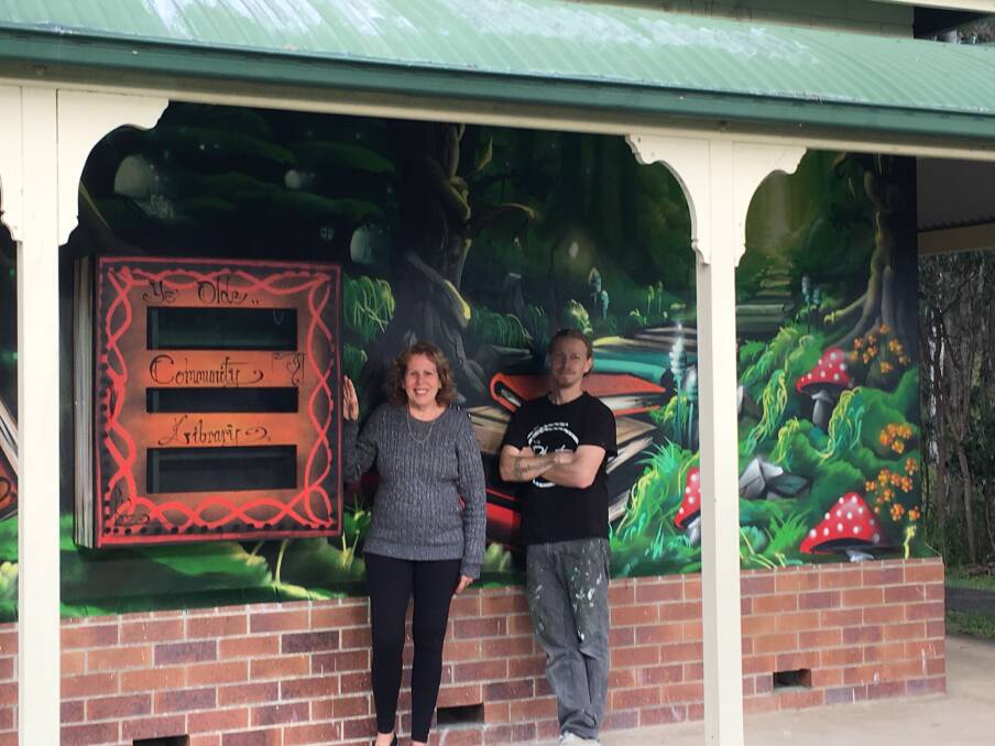 STREET ART: Cr Tracey Huges with artist Ben Strand in front of the Montgomery Park artwork.