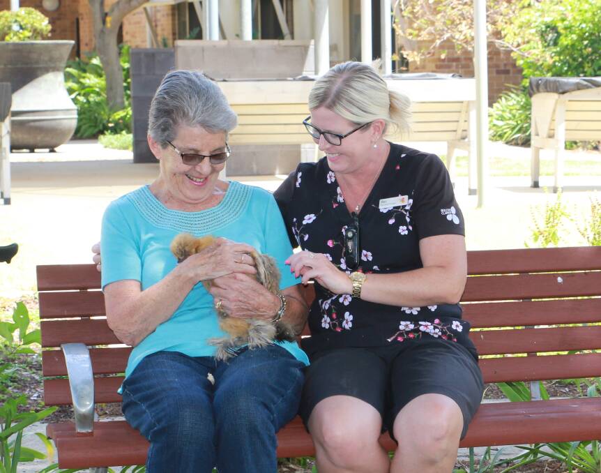 NEW ADDITIONS: Residents, staff and volunteers at Bolton Clarke's Moreton Shores community have welcomed chickens their facility.