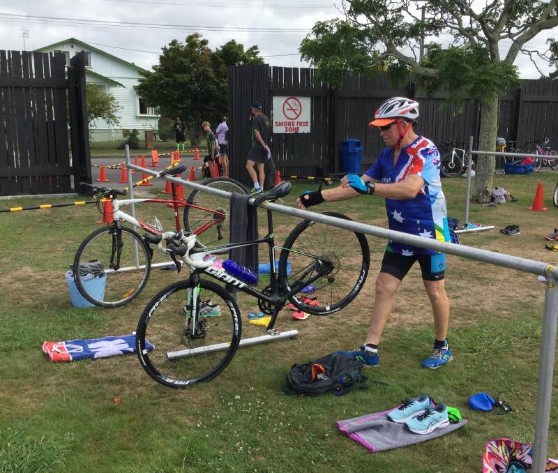 Tony Cameron-Kirk gets ready to ride during the cycling leg of a triathlon in New Zealand.
