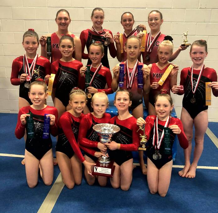 GYMNASTS: YMCA Victoria Point gymnasts pictured after an event earlier this year.