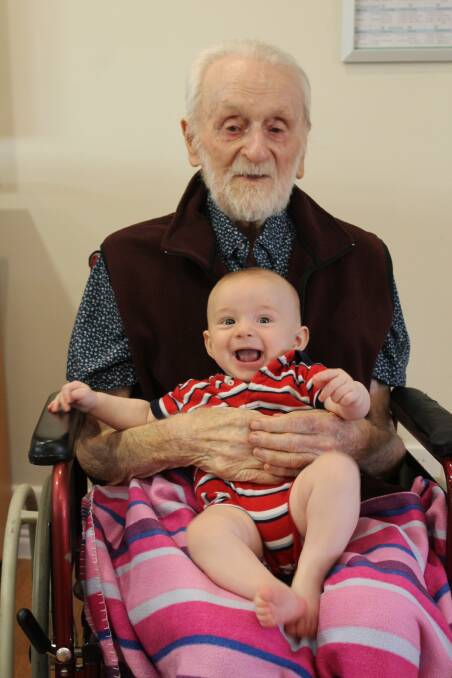 CELEBRATION: Neville Davis celebrates his 105th birthday with his great-grandson Sebastian Davis, four months. Photo: Cheryl Goodenough