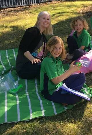 OUTDOORS: Teacher Kirsty Stephenson, Zoe Hilton and Emily Egglestone enjoy time outdoors.