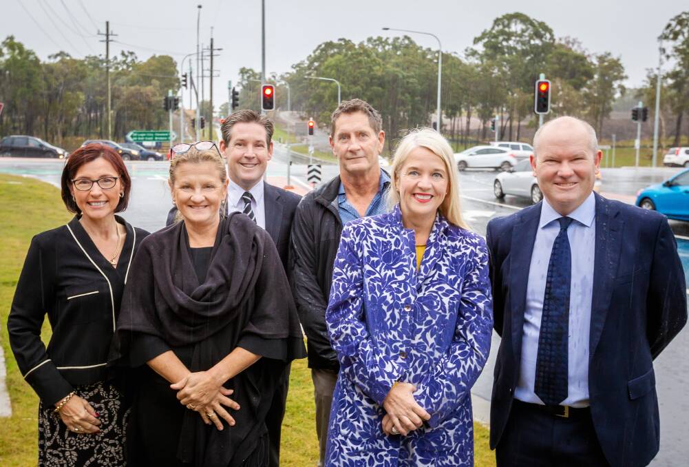COMPLETED: At the Giles and Cleveland-Redland Bay roads intersection are Cr Julie Talty, mayor Karen Williams, Adam Souter (Fiteni Homes), Greg Bell (Fox and Bell Group), MP Kim Richards and Lendlease regional development manager Ian Murray.