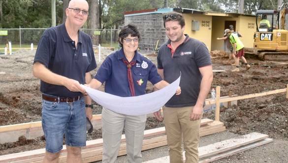 PLANS IN HAND: Den rebuild project manager Doug Ross, Cub leader Julie Bennell and Cameron Marcon of Liona Constructions, Capalaba.