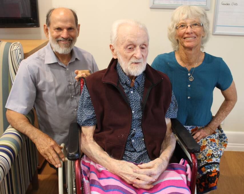 FAMILY: Neville Davis at his 105th birthday party with his son Keith and daughter-in-law Ann Davis, of Redland Bay. Photo: Cheryl Goodenough