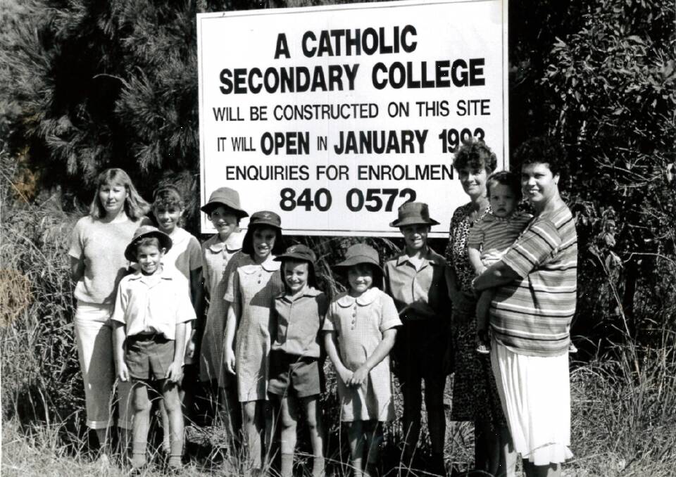 PROPOSED SCHOOL: A billboard at the proposed development site for Carmel College in Ziegenfusz Road, Thornlands. Photo: Supplied