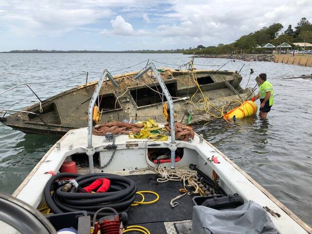 OPERATION UNDER WAY: Contractors Maritime Recovery Group remove an abandoned vessel as part of the War on Wrecks taskforce operation. Photo: Maritime Recovery Group 