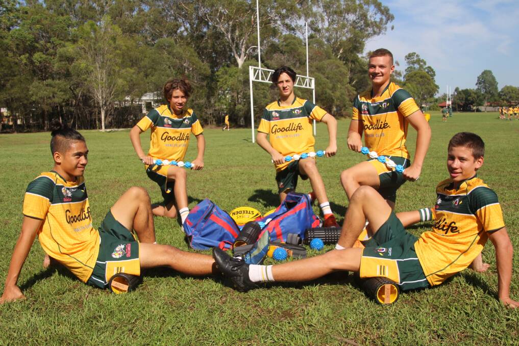 EQUIPMENT: Alexandra Hills State High School league players with the injury management equipment bought by the Redlands Rugby League Old Boys.
