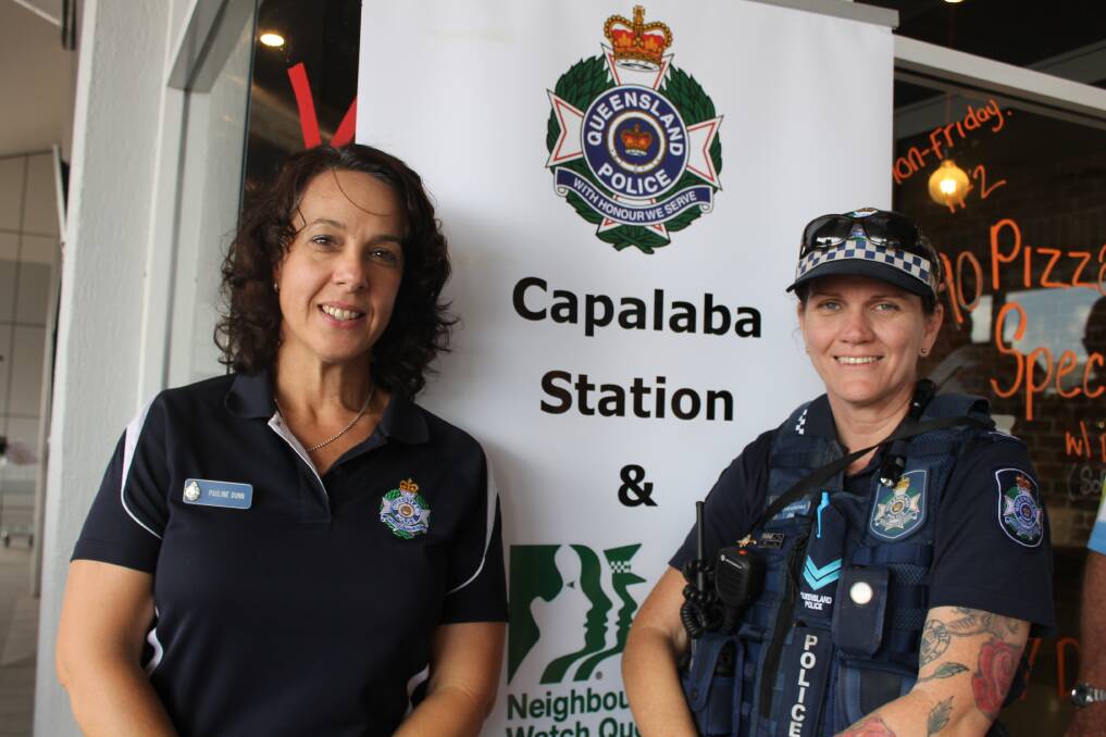 Capalaba Police Beat administration officer Pauline Dunn and Senior Constable Sam Schofield at Coffee with a Cop in Alexandra Hills on Friday. Photo: Cheryl Goodenough
