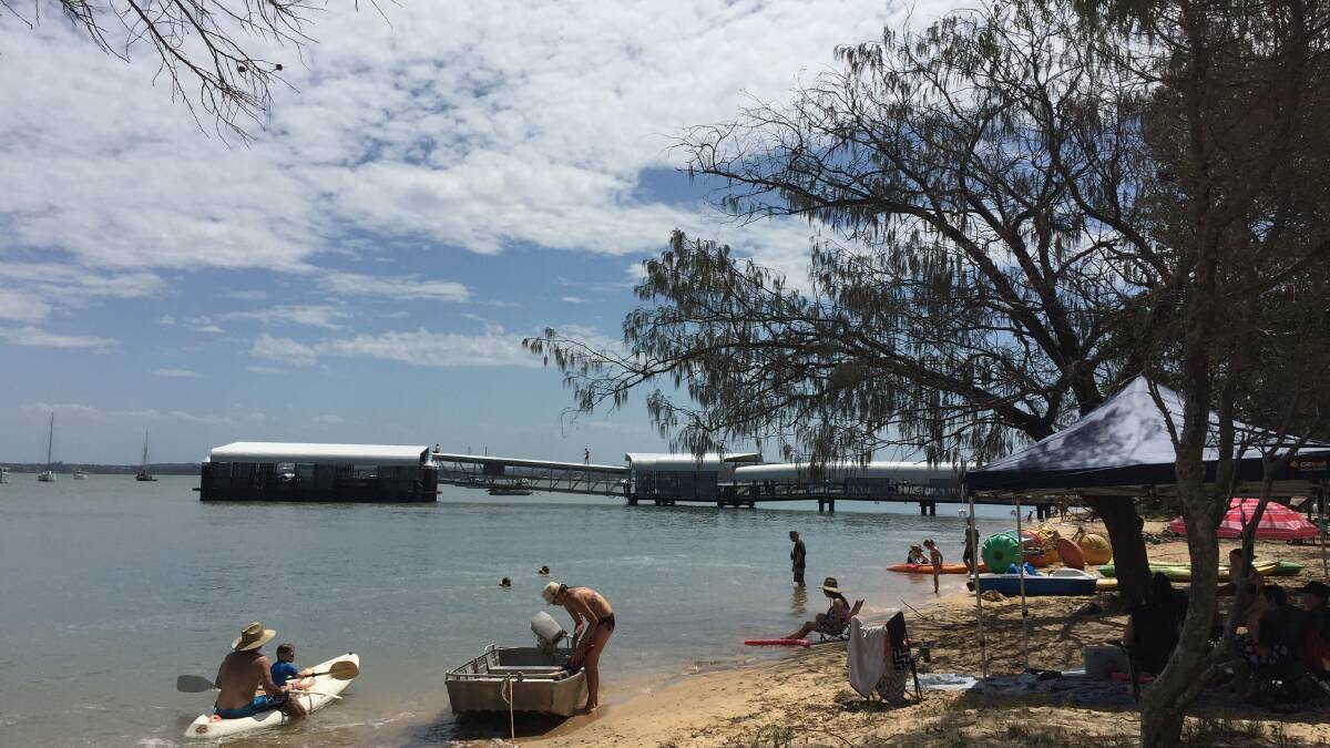 Man rescued at Coochie jetty after boat capsizes