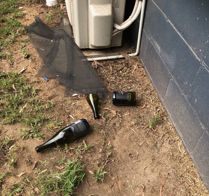 Broken bottles found after the youths left.