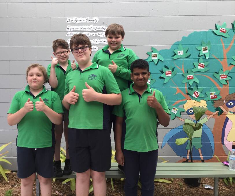 THUMBS UP: Students at the Sycamore School, based at Alexandra Hills TAFE, last year welcomed the news that years 7 and 8 will be offered this year. Photo: The Sycamore School