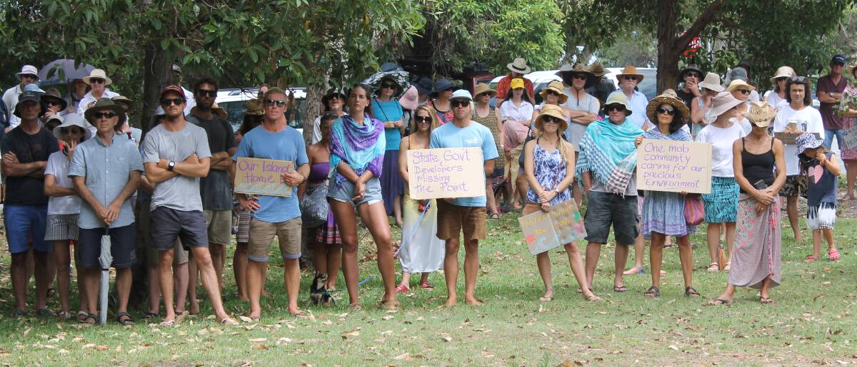 PROTEST SIGNS: People opposing the location of the whale facility at the start of the protest. Photo: Cheryl Goodenough