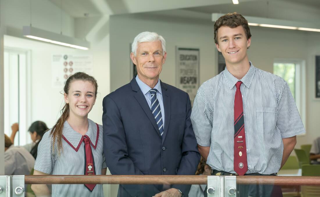 THE PRESENT: Carmel College's school captains for 2017 Jade Leibbrandt and Luke Nolan, with principal Brian Eastaughffe. Photo: Supplied