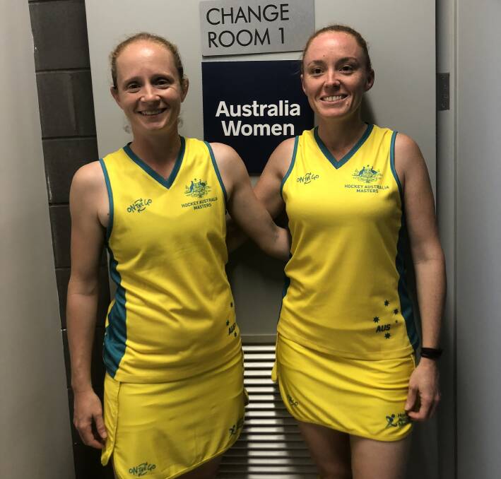 TEAMMATES: Kylie O'Donohue (right) with Australian over-35 teammate Sarah Walton.