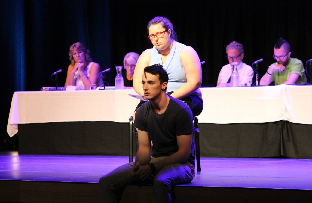 HYPOTHETICAL: Actors Tammy Linde and Mitch Wood perform in front of the expert panel during the suicide prevention event. Photo: Cheryl Goodenough