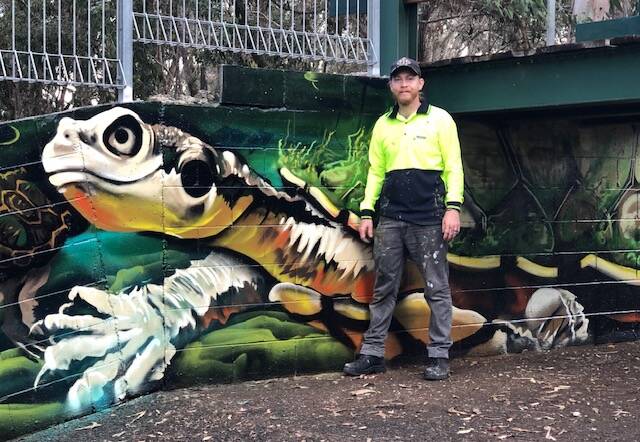 THORNLANDS: Artist Ben Strand with his artwork at Crystal Waters Park at Thornlands.
