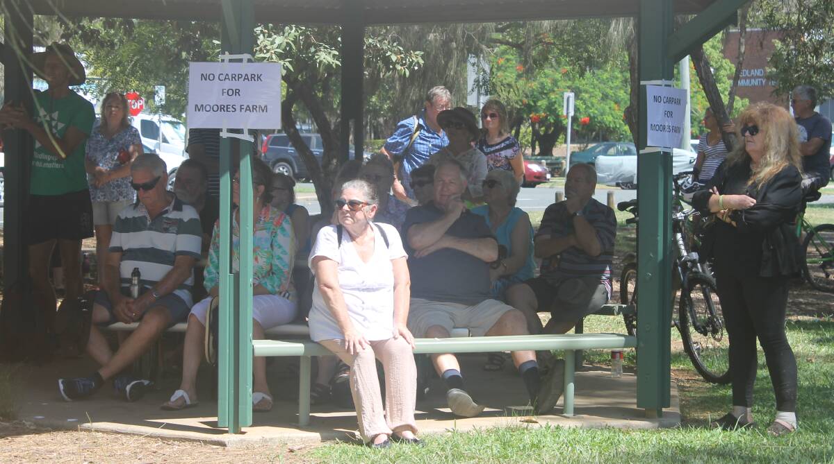 OPPOSING: Residents against the Moores Road car park at a rally in March. Photo: Cheryl Goodenough