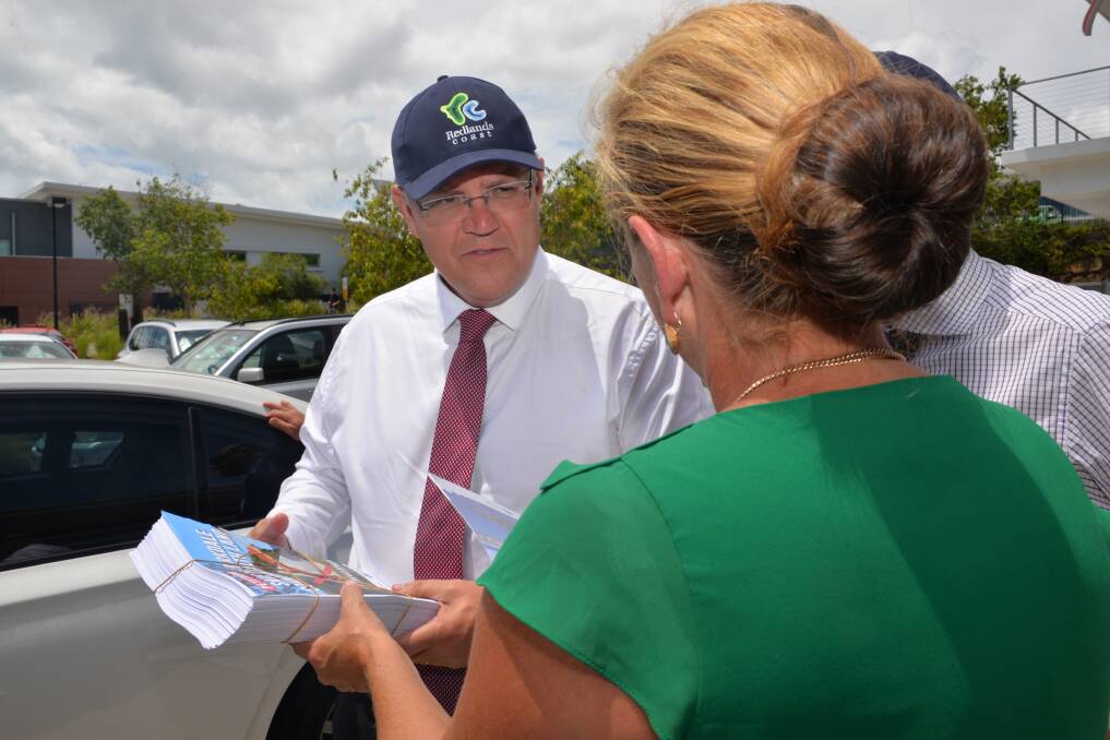 AT CLEVELAND: Mayor Karen Williams (in green) makes her case over the Birkdale bushland to Prime Minister Scott Morrison. Photo: Brian Williams