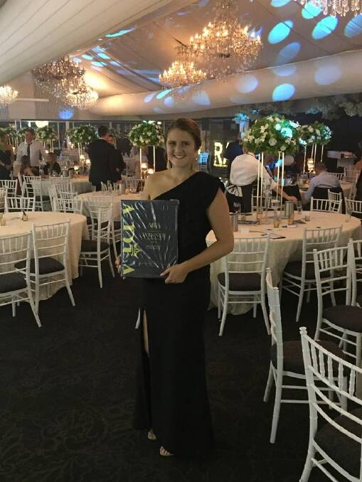 RECOGNISED: Redland Bay Golf Club function co-ordinator Chelsea Morris with the award.