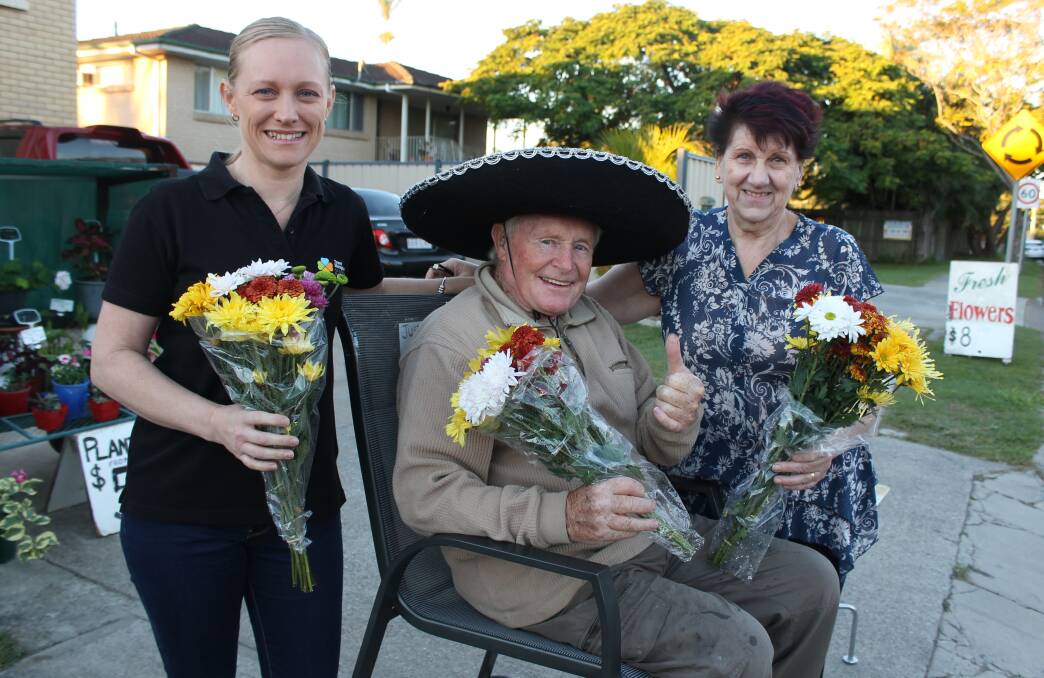 WELCOMING: Amanda Brady, of Wellington Point, shared a post on social media about flower seller Walter Graves and his wife Valerie. Photo: Cheryl Goodenough