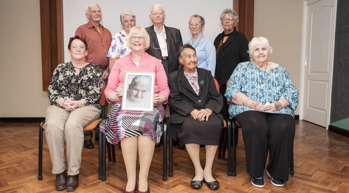 INSPIRING: Winners of the Blue Care Redland Inspiring Seniors Awards were recognised for their contribution to the city. The award winners are Alf Allison, Kathy Huf, Peter Lindley, Jill Lindley, Lynette Shipway and (front) Sue Adams, Carol Brough holding a photograph of Isabella Alcock, Aunty Margaret Iselin and Joan Brennan.