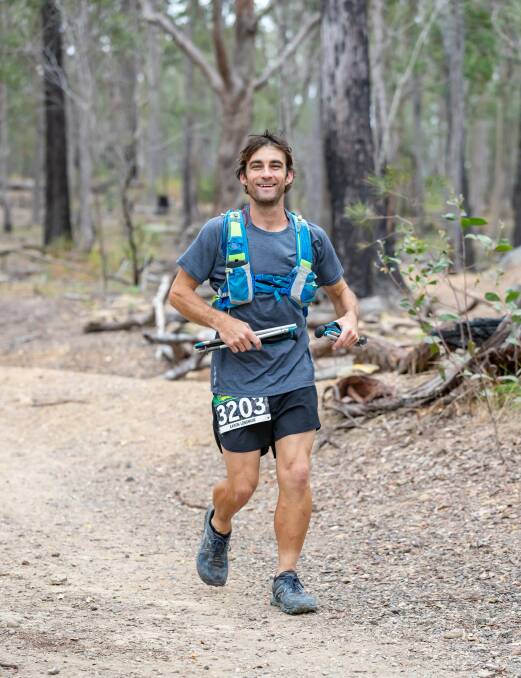 NERANG: Aaron Longmuir taking part in the 320 kilometre event in the Nerang State Forest.