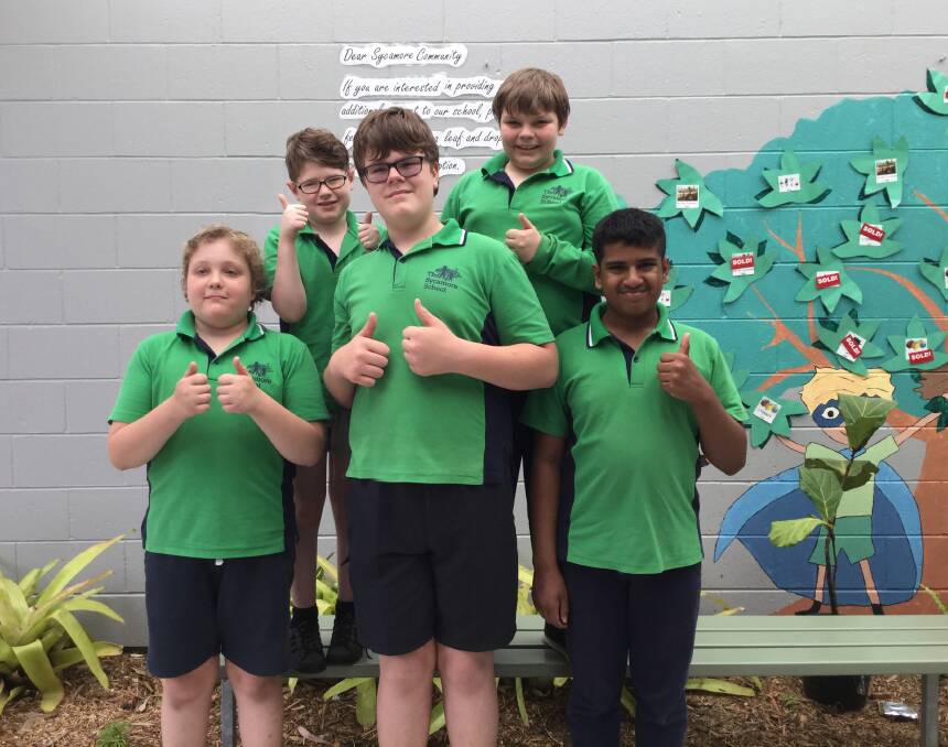 THUMBS UP: Students at the Sycamore School, based at Alexandra Hills TAFE, welcome the news that years 7 and 8 will be offered next year. Photo: The Sycamore School