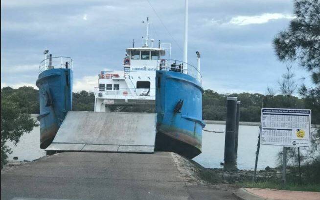BLOCKED: A Stradbroke Ferries barge was grounded at Russell Island's High Street ramp last month, causing vehicle ferry services to be suspended.