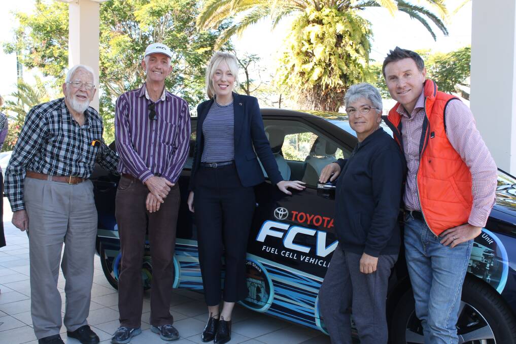 READY TO DRIVE: Harold Waring of Victoria Point, Gary Crighton of Cleveland, Hydrogen Mobility Australia chief executive Claire Johnson, Veronique Gineste of Cleveland and Bowman MP Andrew Laming with a hydrogen fueled car. Photo: Cheryl Goodenough