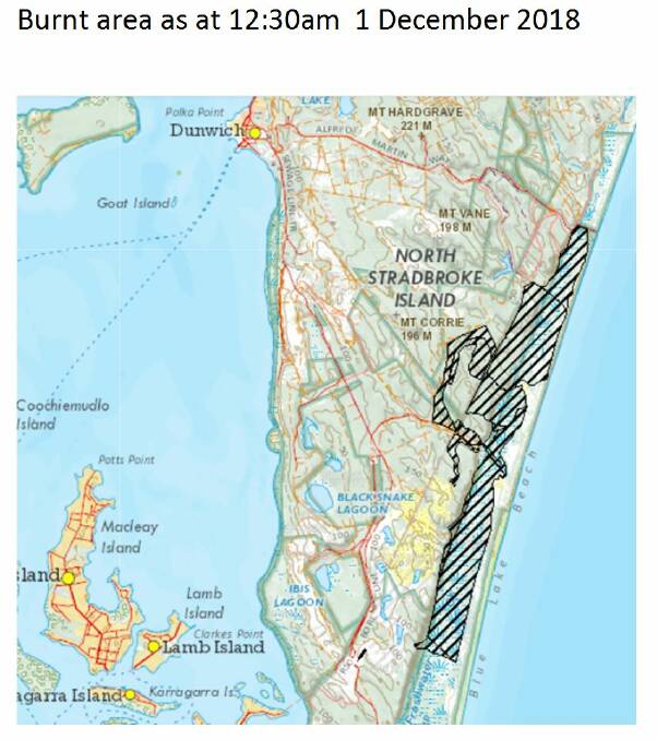 FIRES CONTINUE: The marked area shows the 1100 hectares already burnt on North Stradbroke Island.