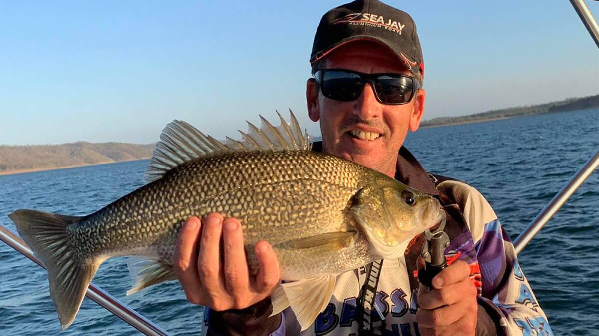 Gary Fitzgerald with a fat 50cm bass caught and released from Wivenhoe Dam