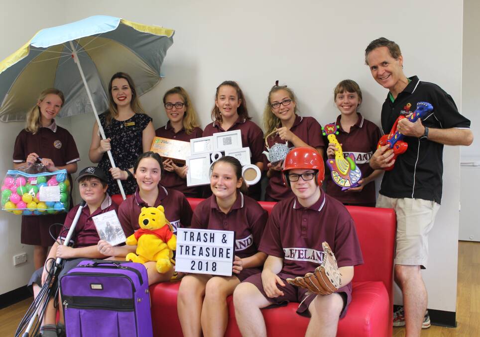IN PREPARATION: Sarah Woodward and Neale Collier and students from the school's chaplaincy committee sort some of the donations that will be sold at their trash and treasure sale. Photo: Cheryl Goodenough