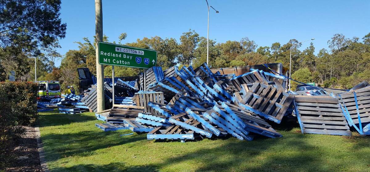 CRASH: Pallets strewn on the side of the road from a truck crash on Mount Cotton Road. Photo: Supplied