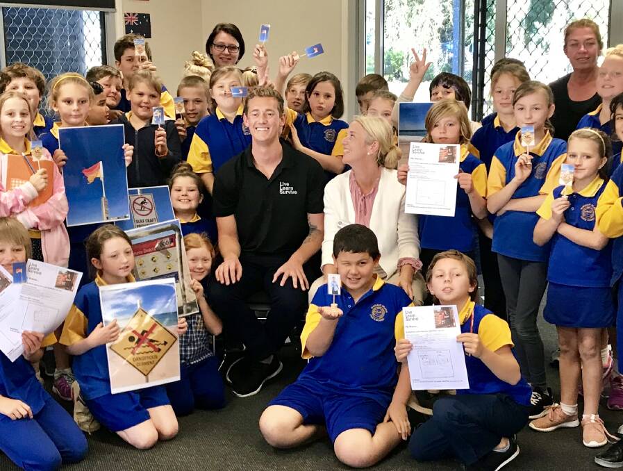 VISIT: Trent "Maxi" Maxwell visits students at Macleay Island State School to talk about fire and water safety. 