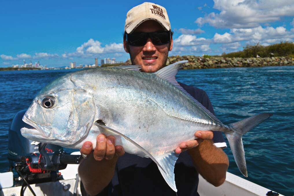 NICE CATCH: :Mick Kovarik with a trevally he caught on the Gold Coast Seaway at the weekend.  Picture: Supplied.