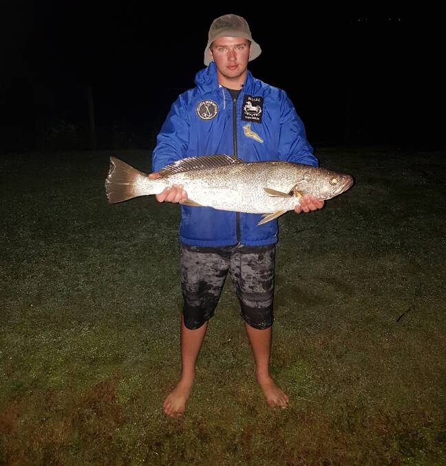 NICE CATCH: Sean Brown with a 90cm mulloway from the Logan River.