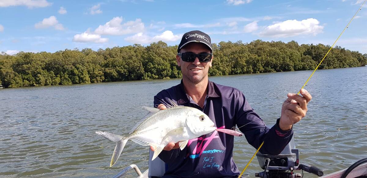 NICE FISH: Randy Keeble with a good-looking, lure-caught trevally from the Brisbane River. 